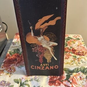 3 bottle Asti Cinzano wine rack with woman riding grapes